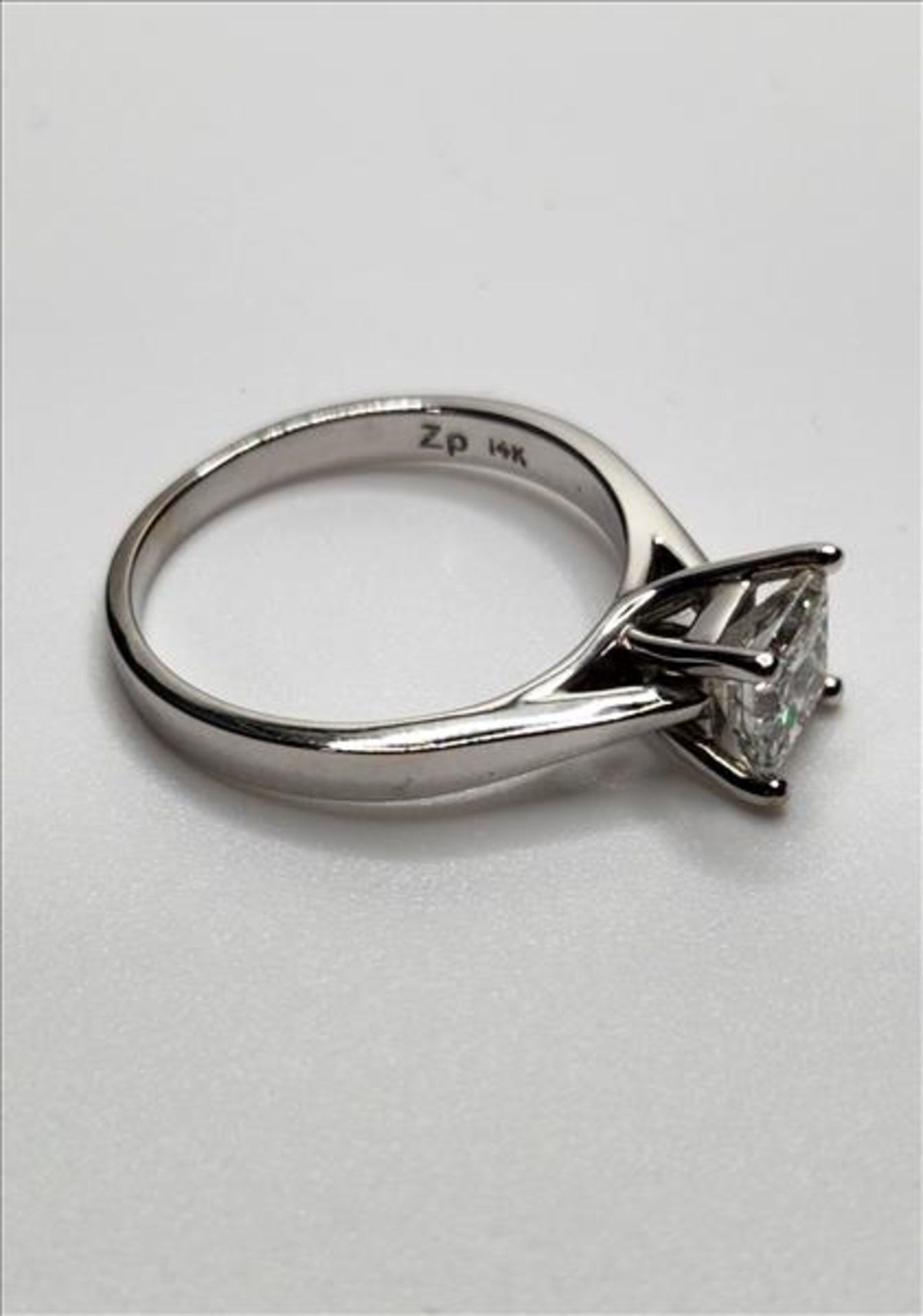 One lady’s stamped and tested 14kt Zp diamond solitaire ring. Contained at the centre is one 8. - Image 4 of 11