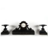 Garnish with clock in black marble, late 19th century