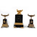 Charles X style garniture in obsidian and gilt bronze with pair of putti