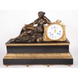 Large mantle Clock with the motif of a Lady reading, French school of the 19th century