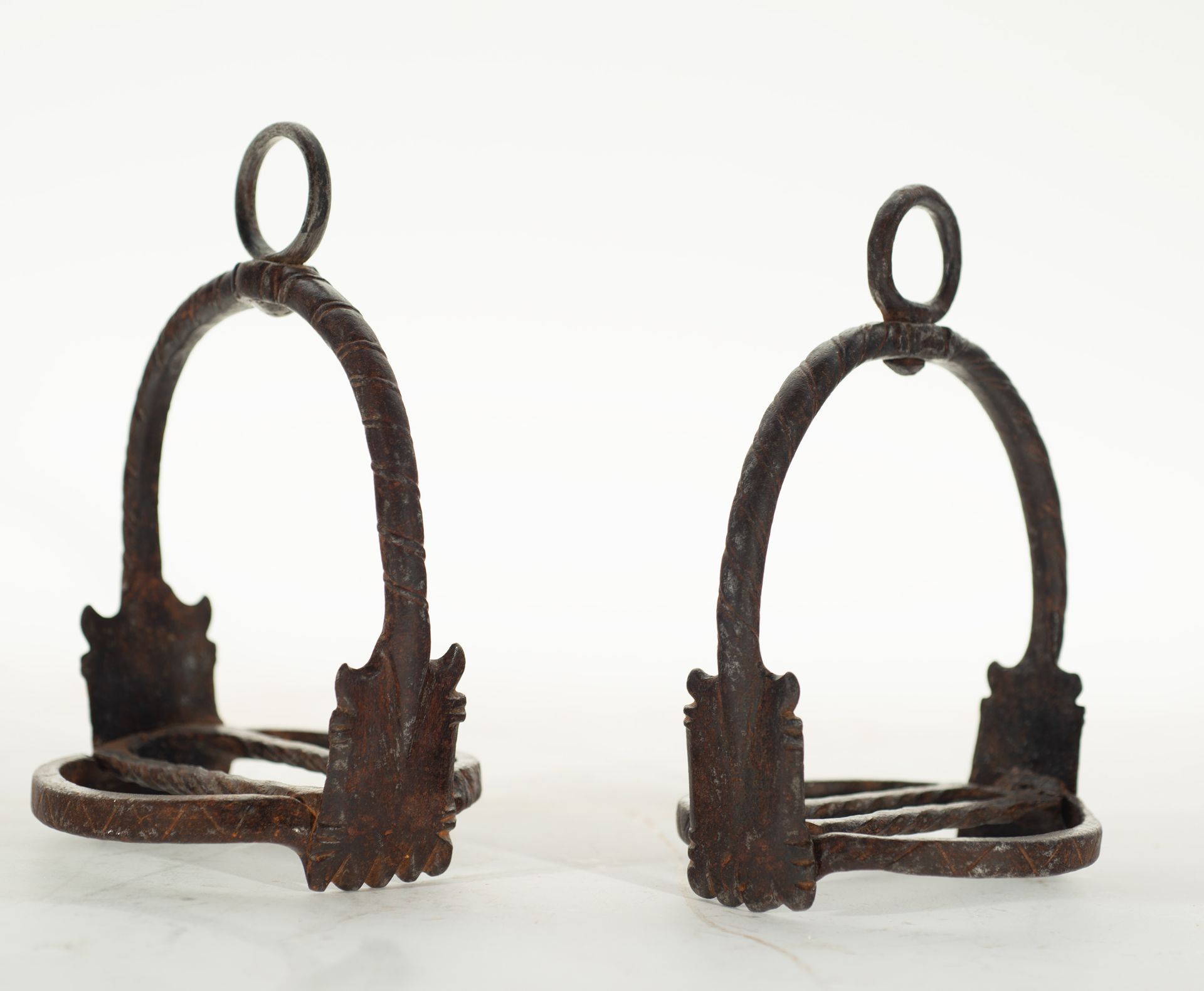 Pair of Spanish wrought iron stirrups, 17th century