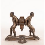 Candlestick in Bronze representing two Slaves, French school of the 19th century
