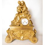 Clock in gilt bronze, with motif of Virgin with Child, French school of the 19th century, Charles X