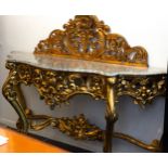 Italian console in gilt wood with gold leaf, Italian school of the 19th century