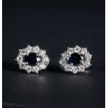 Elegant pair of earrings in 18k white gold with diamonds and central sapphire
