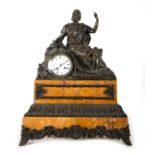 Patinated bronze and Aleppo marble clock depicting Socrates, Regency style