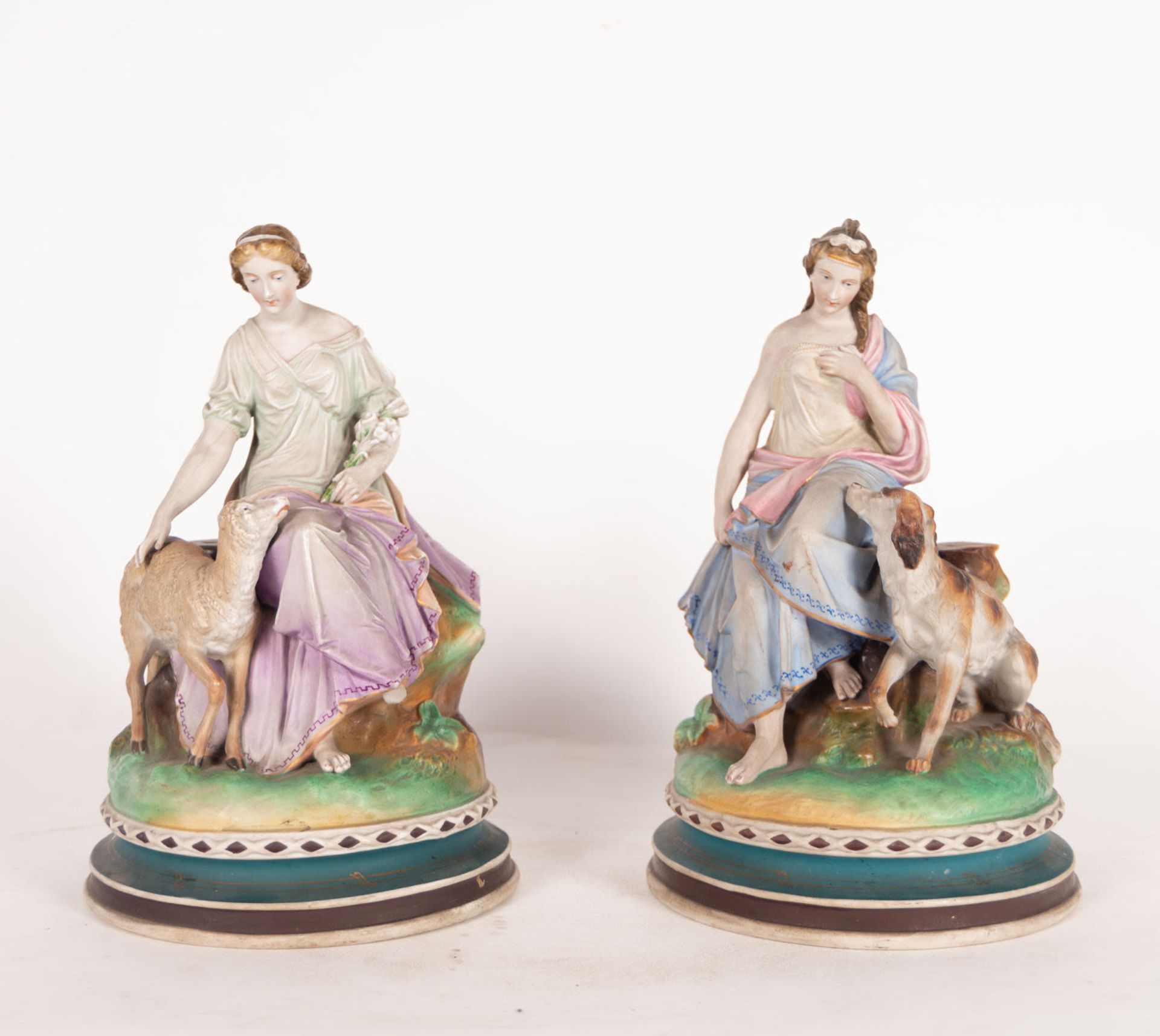 Pair of Shepherdesses in Biscuit Porcelain, Italian school of the late nineteenth century