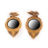 Important pair of federal style mirrors in the shape of eagles, 19th century American school