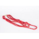 Large Bead Necklace with three rows in Red Coral, with 18 kt gold clasp