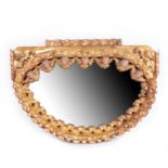 Rare Crescent-shaped Mirror in gilded wood tied with Angelote heads, colonial school of Cuzco, Peru,