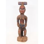African figure representing Yoruba Maternity from Nigeria in Wood, African school of the 20th centur