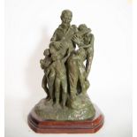 "The Music Lesson", sculptural group in patinated bronze with a wooden base, 20th century