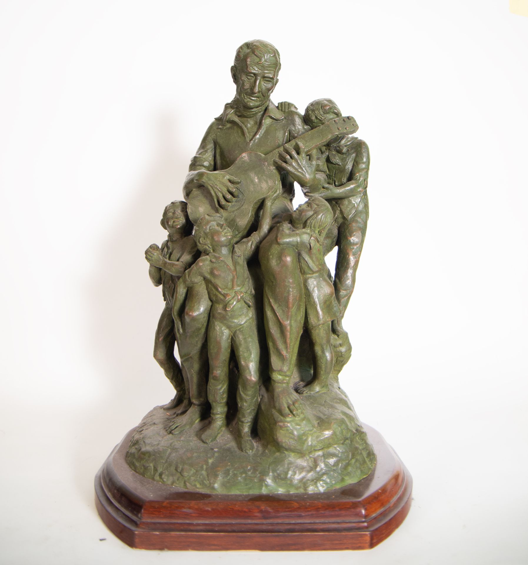 "The Music Lesson", sculptural group in patinated bronze with a wooden base, 20th century