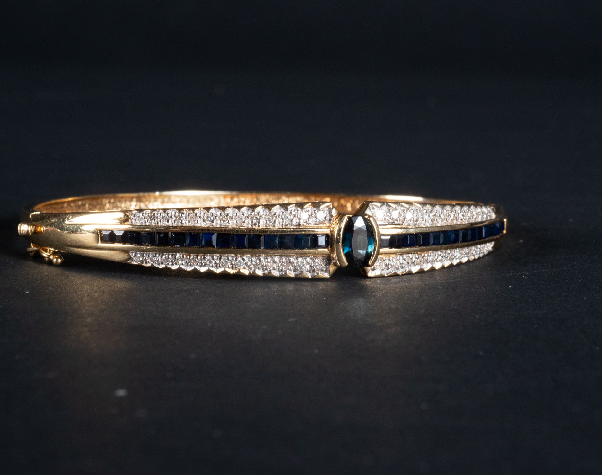 18k yellow gold, sapphire and diamond bangle