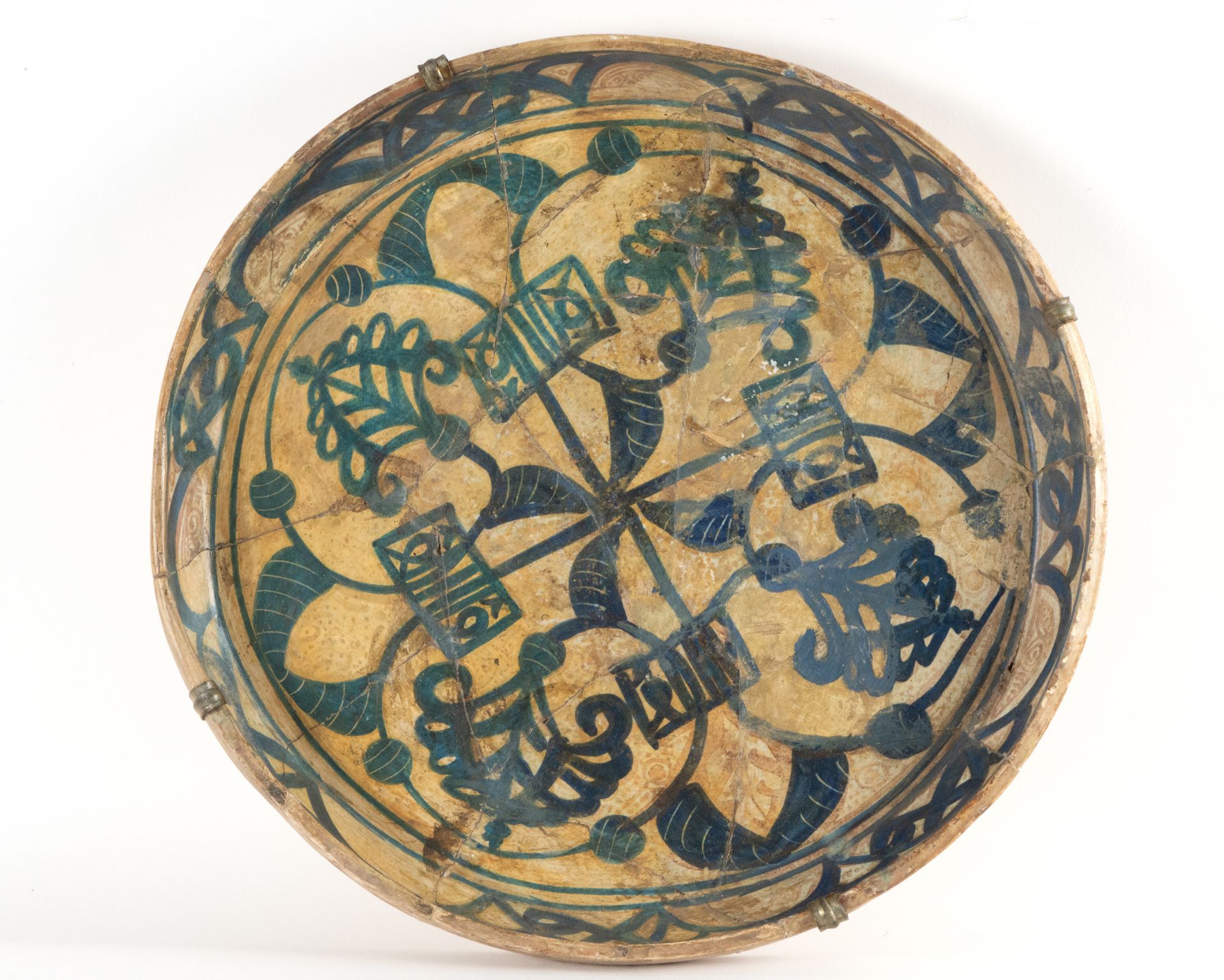 Plate in blue enamel and reflections of Hispano-Arab copper, 15th - 16th centuries