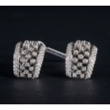Pair of Damiani Earrings in 18k white gold and diamonds
