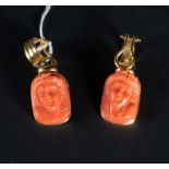 Pair of earrings with an important pair of cameos in red coral representing caryatids