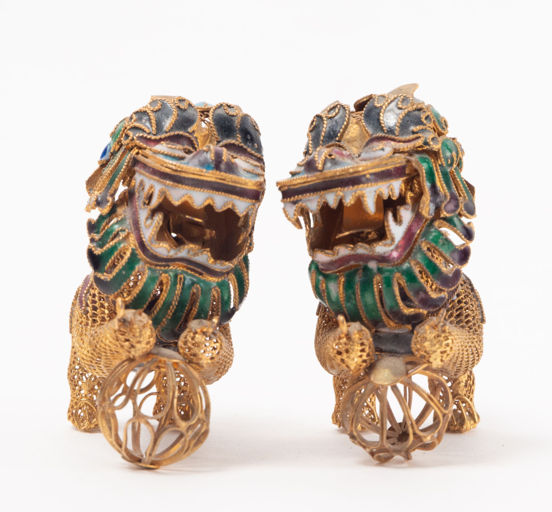 Pair of Foo Dogs in gilt filigree and enamels, 20th century