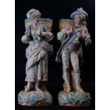 Pair of German Porcelains representing a Peasant couple in polychrome biscuit, 19th century