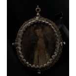 Colonial Medallion Silver Reliquary with Saint Teresa in Transverberation, 17th century