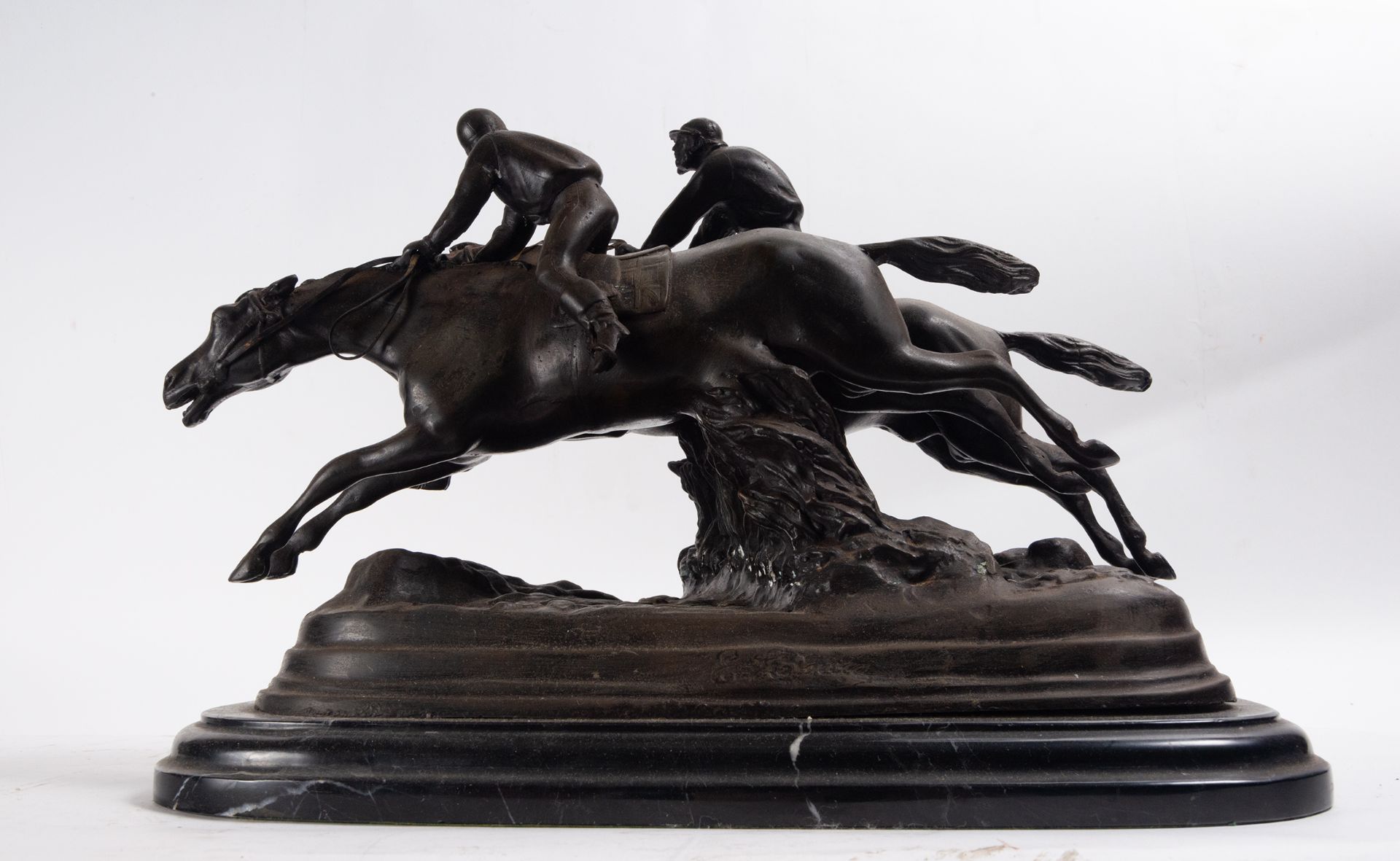 Jockeys on Horseback, sculptural group in Patinated Bronze, 20th century