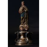 Virgin of Granada in terracotta with a silver base, 17th century