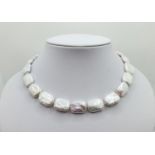 Cultured pearl necklace "cornflake" type and 14k gold clasp
