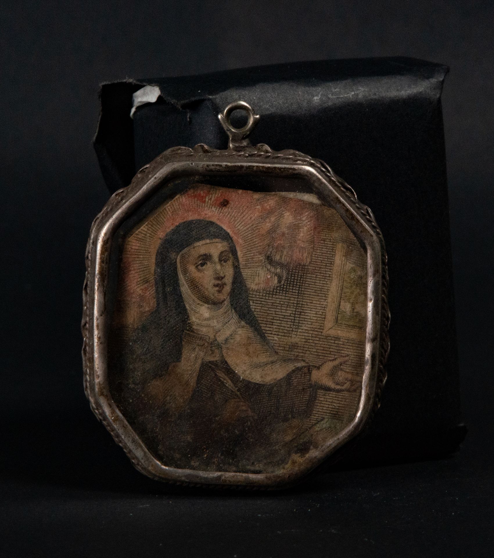 Silver Octagonal Medallion Reliquary with Saint Teresa of çvila, 17th century