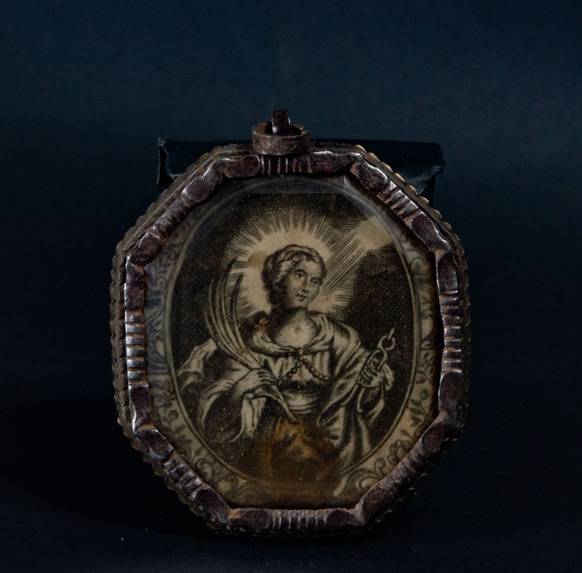 Octagonal Wrought Iron Medallion of Santa Apolonia with Relics on the reverse, 17th century