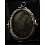 Small silver pendant reliquary of Saint Barbara on parchment, 17th century
