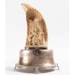 Walrus carved tusk representing Saint Mark the Evangelist on a silver base, 20th century