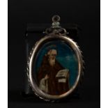 Silver oval pendant reliquary with Virgin and Saint Francis of Paula painted on glass, 17th century