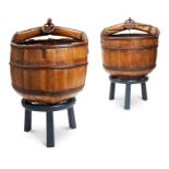 A pair of hardwood coopered well buckets, probably Chinese, early 20th century