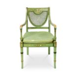 An Edwardian green and floral painted open armchair