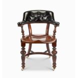 A Victorian walnut desk chair