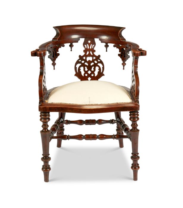 A Victorian Elizabethan revival walnut carved desk chair