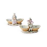 A pair of late 19th century Meissen figural sweetmeat dishes