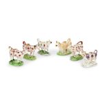 A collection of six 19th century Staffordshire cow creamers including four lustre decorated examples