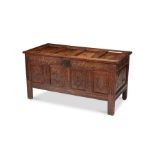 A 17th century oak carved chest