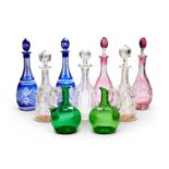 A group of seven decanters including Bohemian red flashed and blue flashed decanters (7)