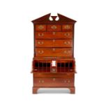 A George III mahogany secretaire chest on chest