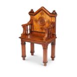 A Victorian Gothic style oak carved hall chair