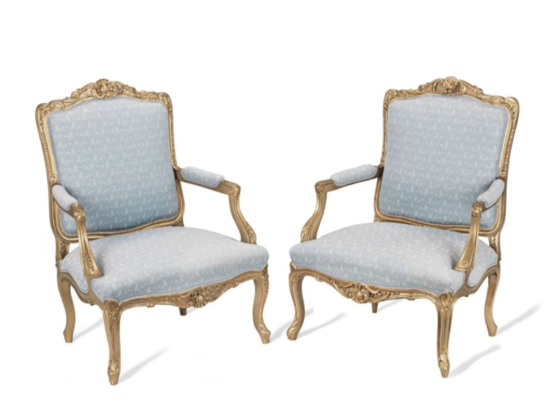 A pair of 20th century Louis XV style giltwood fauteuils
