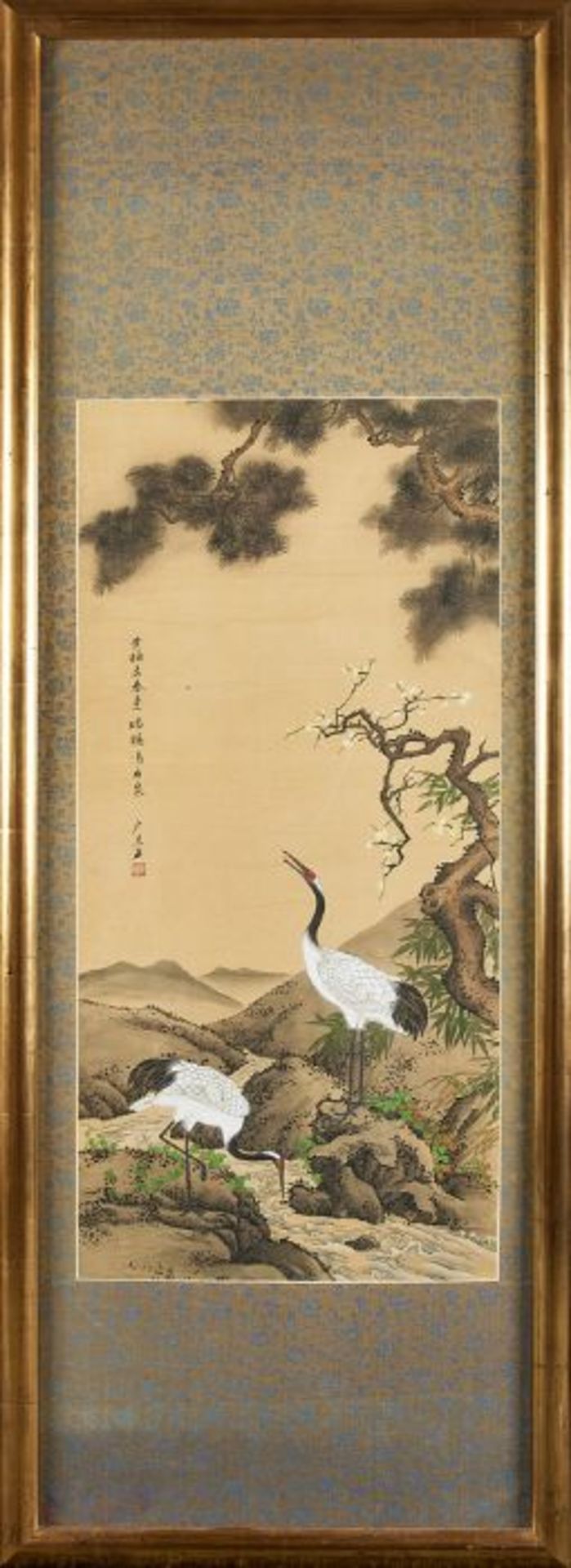 A large 20th century gilt framed Chinese pen and watercolour on silk of a pair of cranes