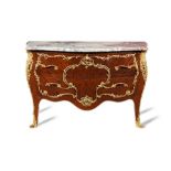 A late 19th century / early 20th century Louis XV style kingwood and marquetry commode retailed by M