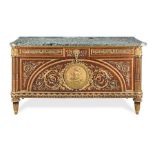A late 19th century Louis XVI style mahogany and gilt bronze mounted commode à vantaux