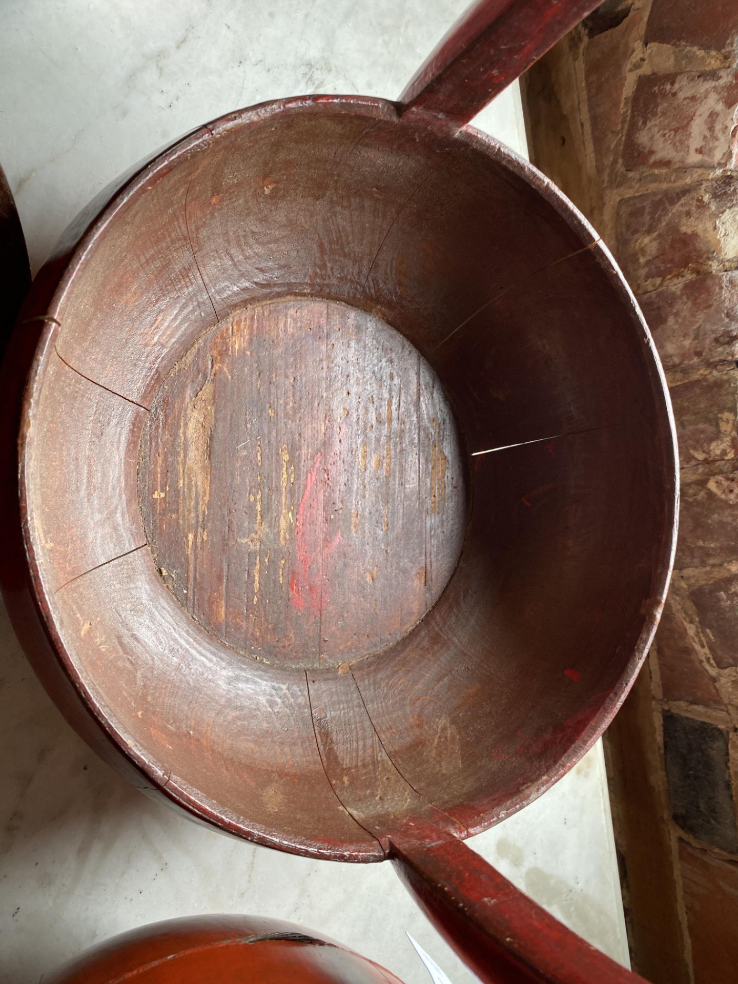 An early 20th century Chinese teak rice measure and three Chinese red lacquered rice carriers - Image 9 of 14