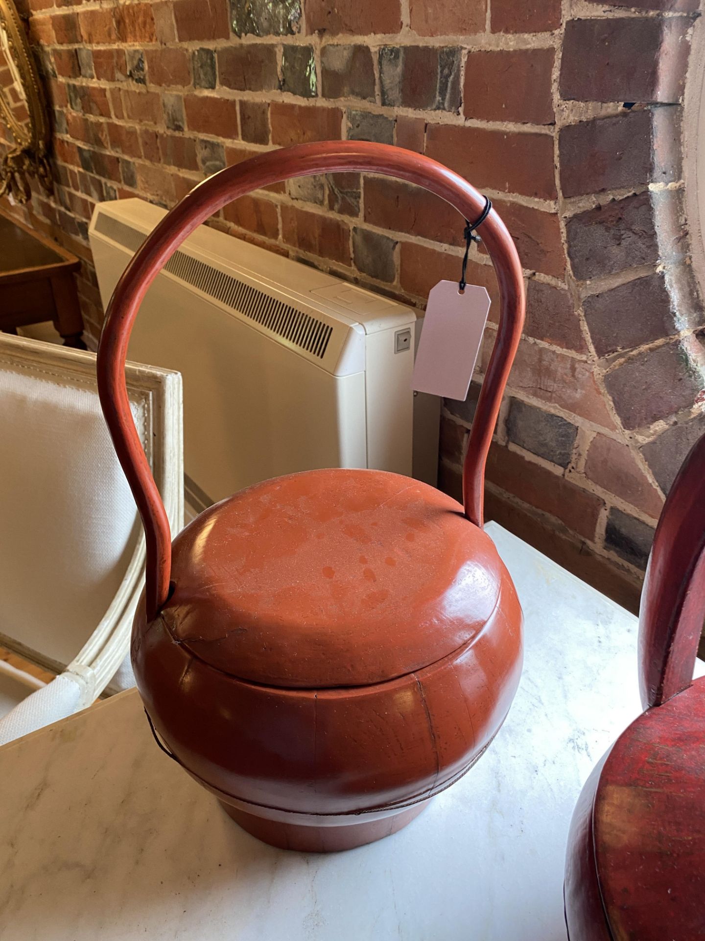 An early 20th century Chinese teak rice measure and three Chinese red lacquered rice carriers - Image 6 of 14