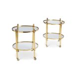 A pair of 1970's lacquered brass two-tier etageres