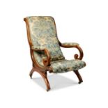 A William IV carved rosewood reclining open chair